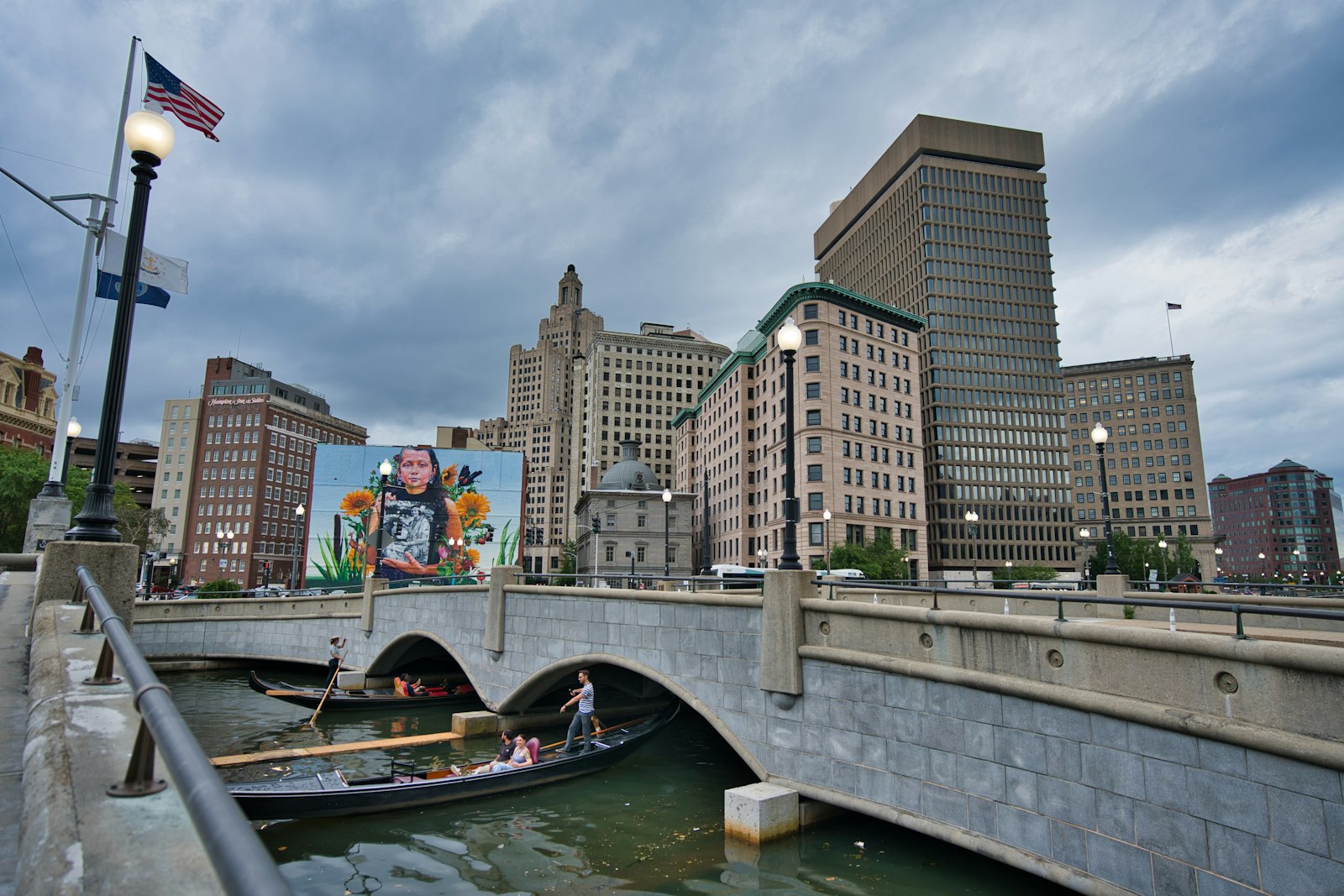 Downtown Providence from the riverwalk, with the stone arch bridge in the foreground.